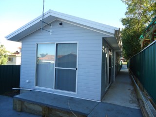 View profile: Air Conditioning & Tiled Throughout
